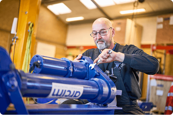 Engineer inspecting arcím actuator